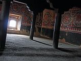 Mustang Lo Manthang 04 04-1 Jampa Gompa Upper Floor There are 28 mandalas in a single register on the upper floor of the Jampa Lhakhang in Lo Manthang. There are seven mandalas on the east wall, seven on the south wall, four on the north wall, and ten on the west wall. Below the mandalas are groups of small roundels.